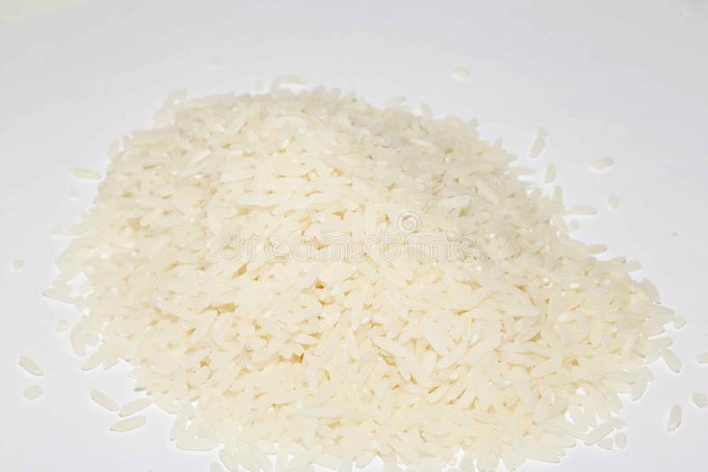 Uncooked dry rice stock image. Image of food, bowl, dried 179321179