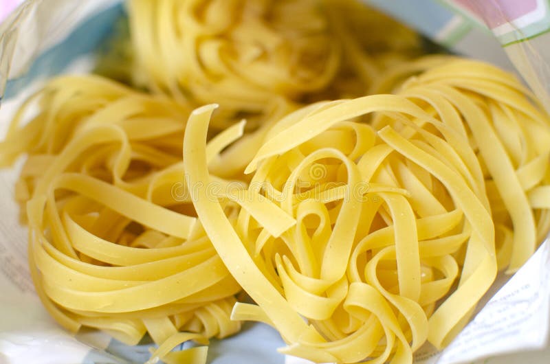 Uncooked Fettuccine in the Package on a Table Stock Photo Image of