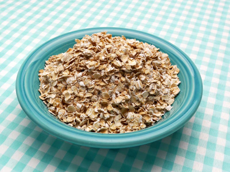 Uncooked Oatmeal in a Blue Bowl Stock Photo Image of oatmeal