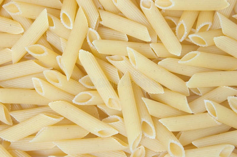 Uncooked penne pasta stock photo. Image of horizontal 11509888
