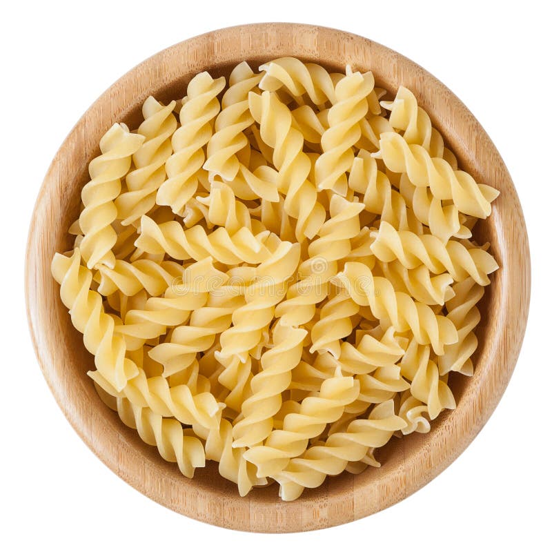 Uncooked Rotini Pasta In Wooden Bowl Isolated On White Background Stock uncooked-rotini-pasta-in-wooden-bowl-isolated-on-white-background-stock