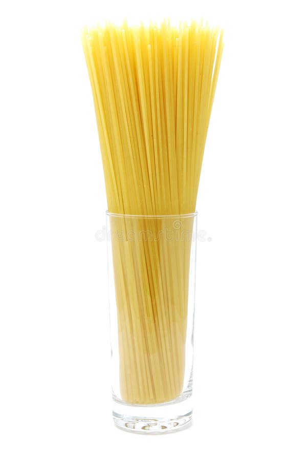 Uncooked spaghetti in glass