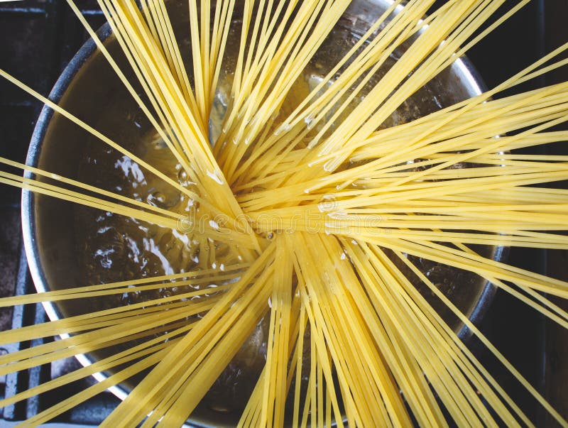 Uncooked Spaghetti Pasta in Boiling Water Stock Image Image of close
