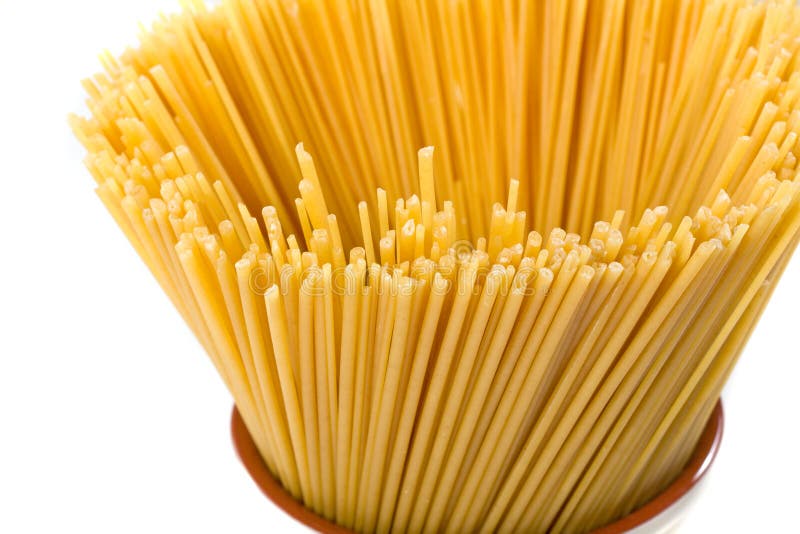Uncooked spaghetti pasta isolated on white background. Italian pasta spaghett stock images, royalty-free photos and pictures