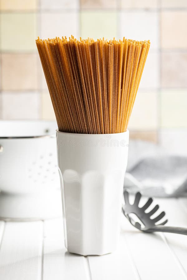 Uncooked Whole Grain Spaghetti. Raw Pasta in Cup Stock Image Image of dinner, lunch 242457575