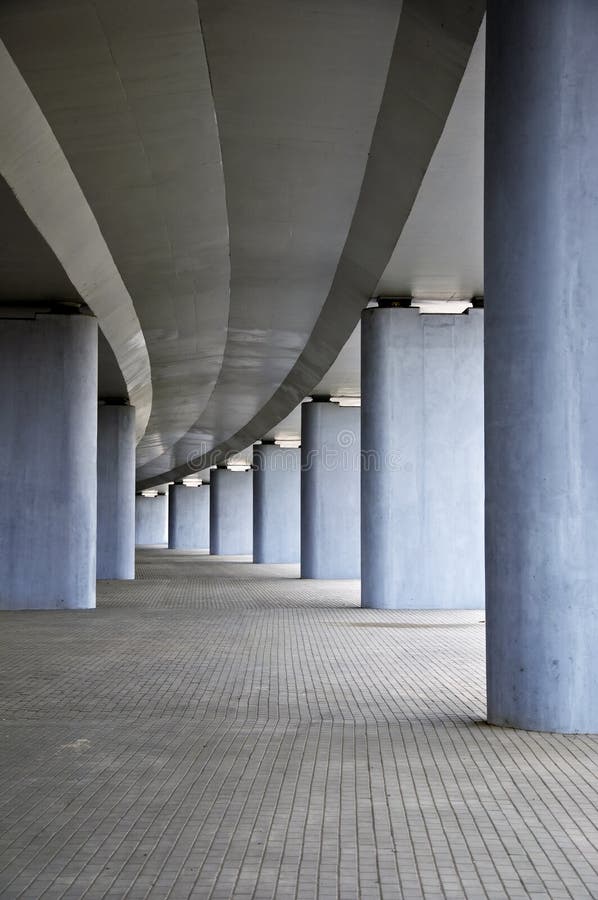 Under concrete road bridge with column