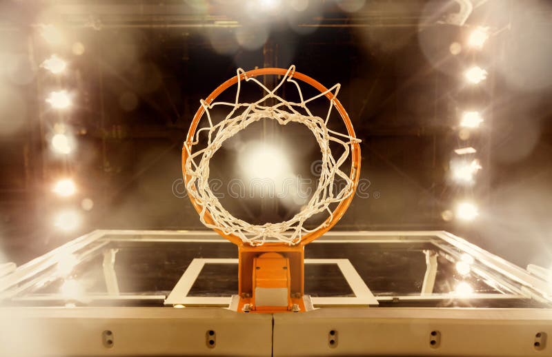 A view from underneath a basketball basket at a professional basketball arena. A view from underneath a basketball basket at a professional basketball arena