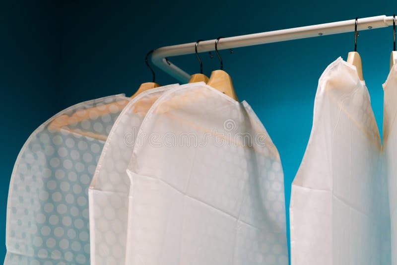 Underexposed of the Dress Cover on Hanger Stock Photo Image of