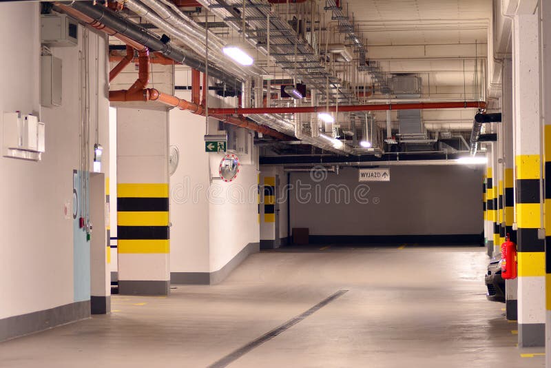 Underground Parking Garage of a Modern Apartment Building Stock Photo
