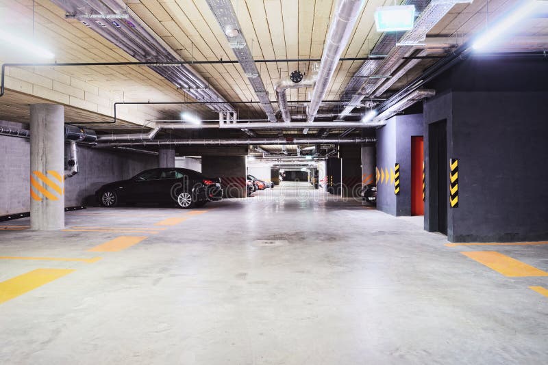 Underground Parking Garage of Modern Apartment Building Stock Image
