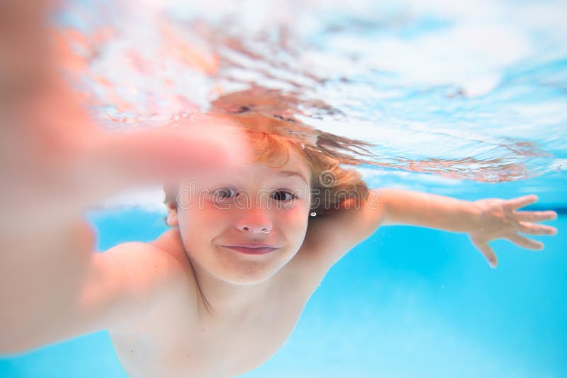 Underwater Boy in the Swimming Pool. Cute Kid Boy Swimming in Pool ...