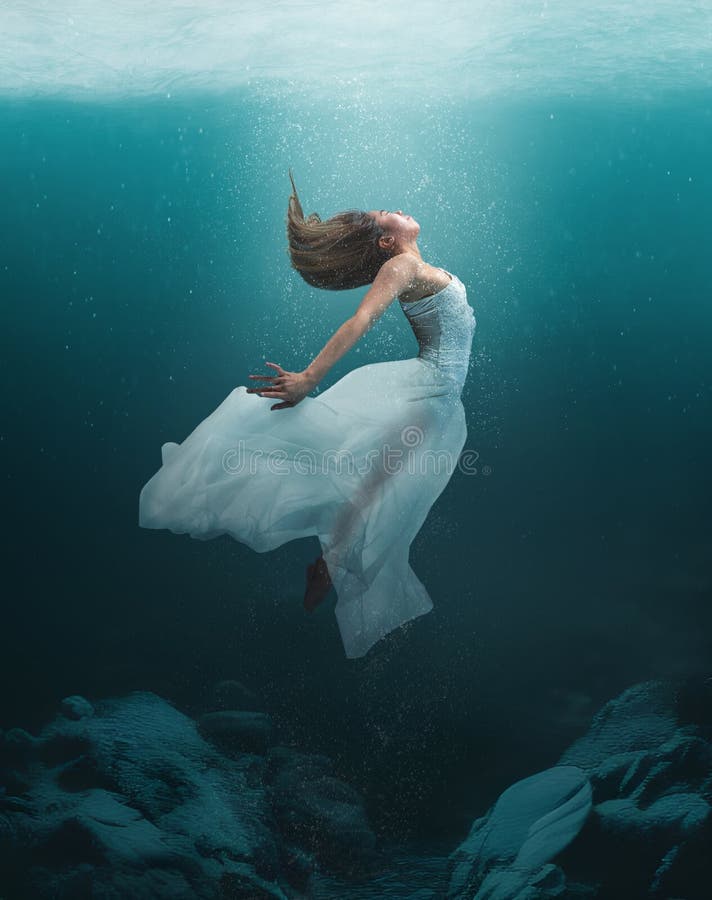Underwater Dancer in an Artistic Elegant Pose with Natural Lighting ...