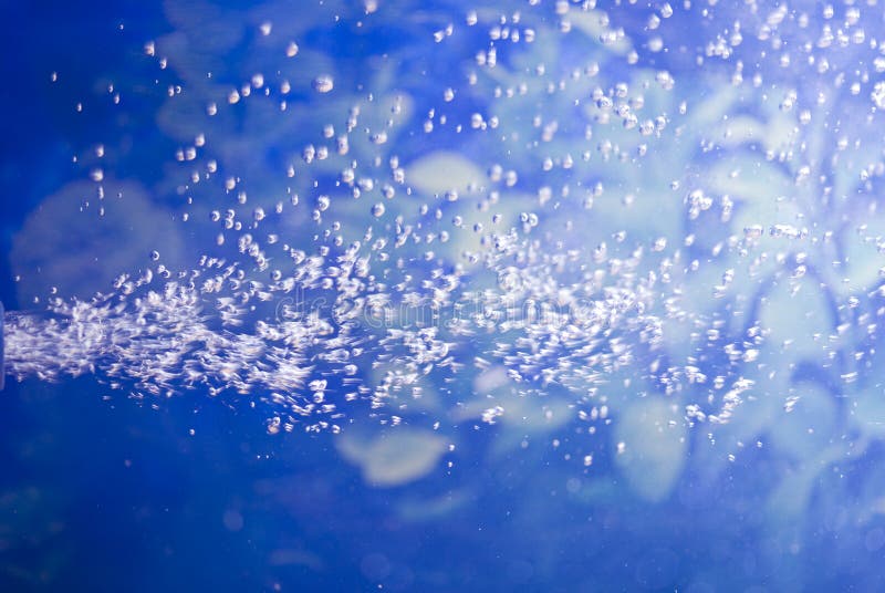 Underwater light and flowing bubbles stock image