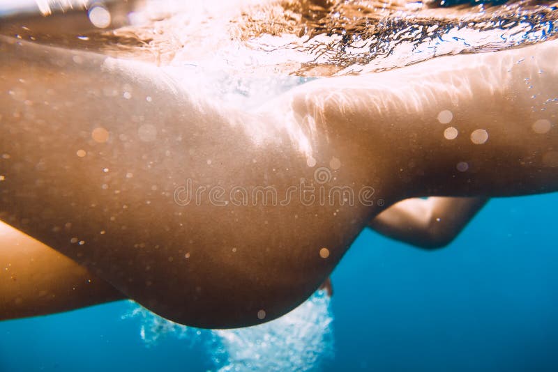 Naked Woman Swimming In Water