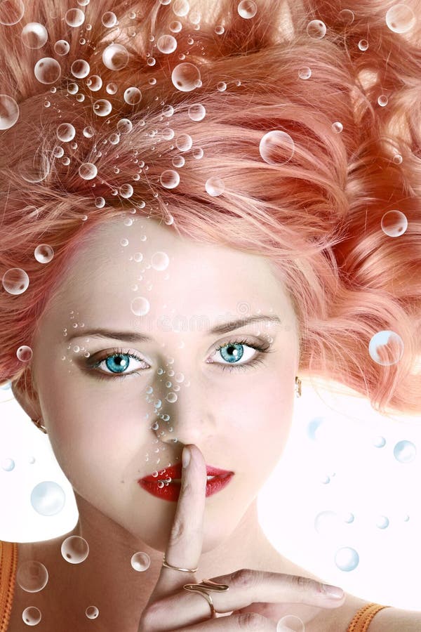 Underwater portrait of beautiful young woman