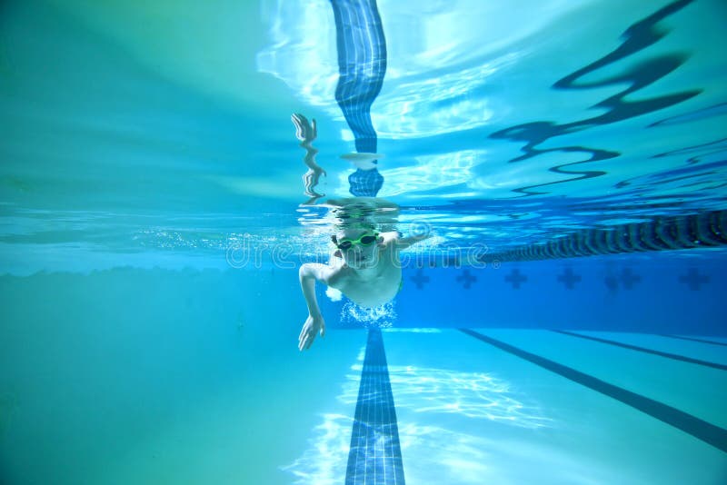 Boy swimming laps stock image. Image of bubble, swim 12625729