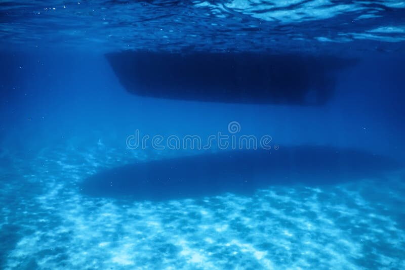 Underwater View, Bottom of a Boat, Sun Shine Beam and Rays