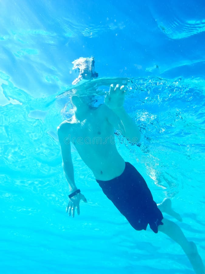 Boy swimming laps stock image. Image of bubble, swim 12625729