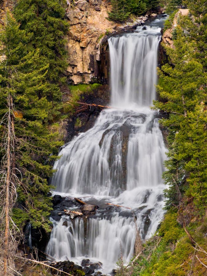 Undine Falls, a waterfall in Wyoming's Yellowstone National Park, pours water down a rocky clif with three distinct plunges on Lava Creek. Undine Falls, a waterfall in Wyoming's Yellowstone National Park, pours water down a rocky clif with three distinct plunges on Lava Creek.