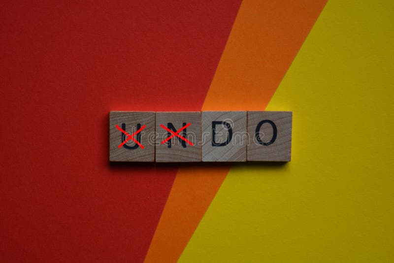 Undo Word on Wooden Cubes with Letters, and Calculator. Lifestyle and ...