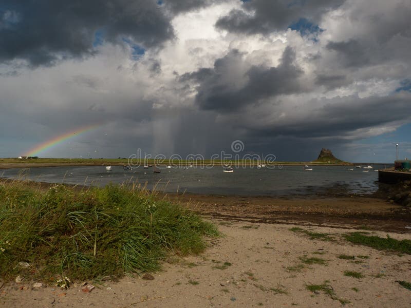 Une augmentation d'arc-en-ciel photographie stock libre de droits Une augmentation d'arc-en-ciel photographie stock libre de droits