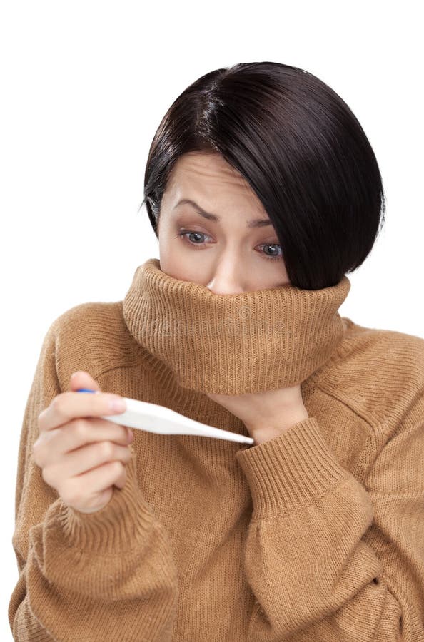 A cold young woman holding thermometer, isolated. A cold young woman holding thermometer, isolated