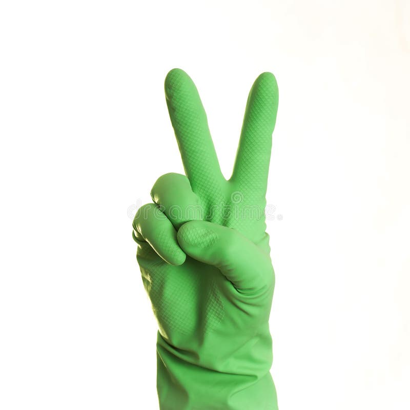 Une main dans le gant vert sur un fond blanc, d'isolement