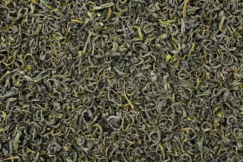 Une pile de thé vert sec images libres de droits Une pile de thé vert sec images libres de droits