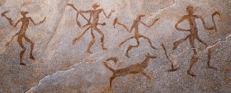 Une scène de la chasse sur le mur de la caverne photographie stock Une scène de la chasse sur le mur de la caverne photographie stock