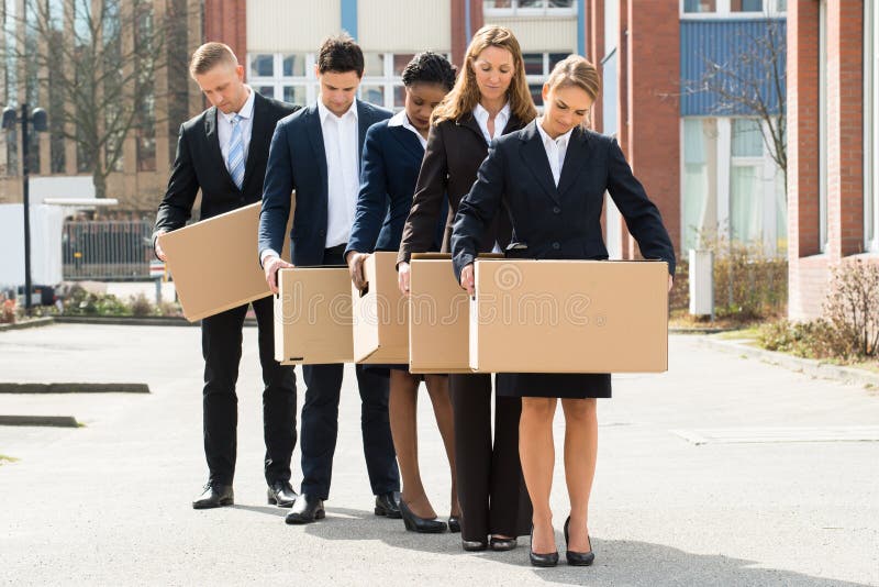 Unemployed Businesspeople With Cardboard Boxes royalty free stock images Unemployed Businesspeople With Cardboard Boxes royalty free stock images