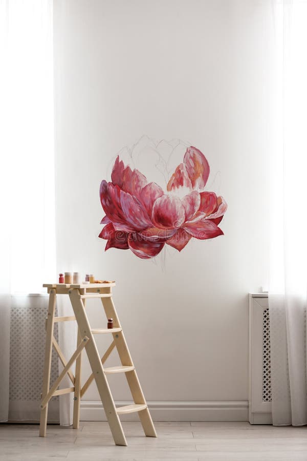 Unfinished flower painting on white wall in room royalty free stock images Unfinished flower painting on white wall in room royalty free stock images