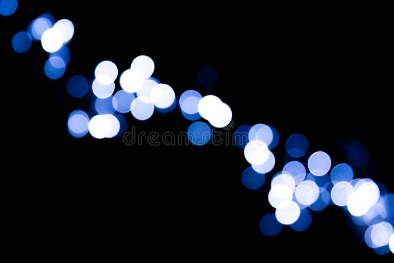 Unfocused abstrakcjonistyczny colourful bokeh czerni tło defocused i zamazujący dużo round błękita światło zdjęcia stock Unfocused abstrakcjonistyczny colourful bokeh czerni tło defocused i zamazujący dużo round błękita światło zdjęcia stock