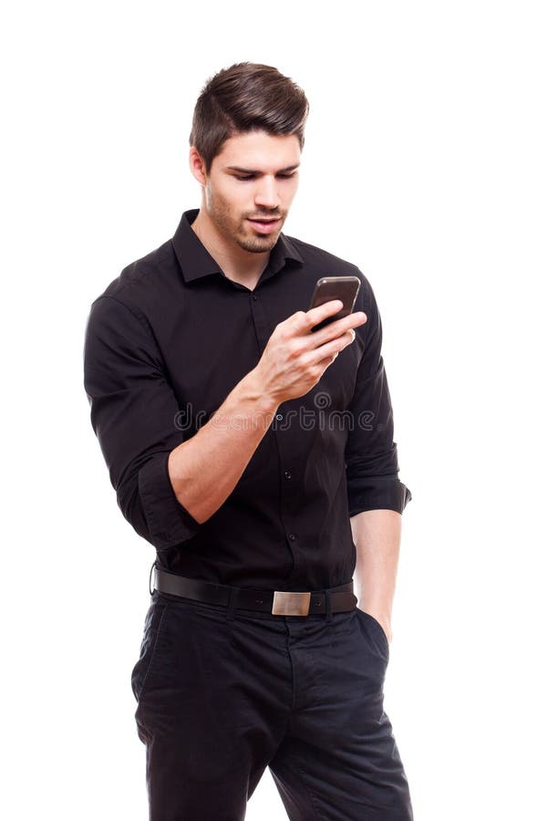 Ung affärsman som använder smartphonen. arkivfoton