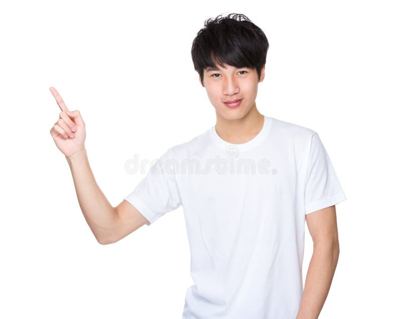Ung asiatisk man som pekar med hans finger royaltyfria foton Ung asiatisk man som pekar med hans finger royaltyfria foton