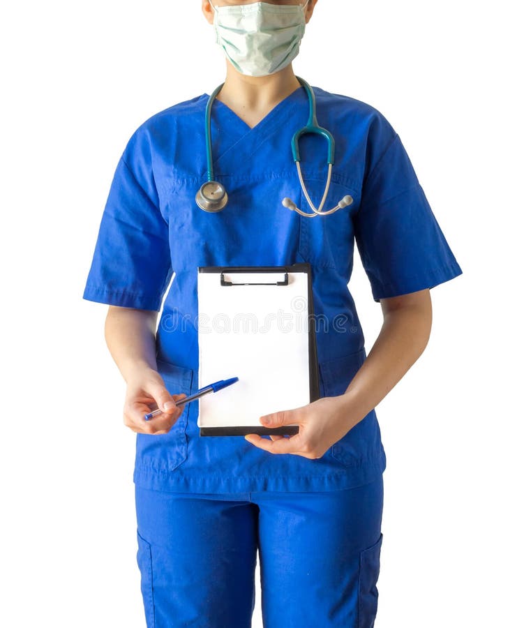 Ung kvinnlig doktor i blå medicinsk likformig som pekar till ett tomt arkivbild Ung kvinnlig doktor i blå medicinsk likformig som pekar till ett tomt arkivbild