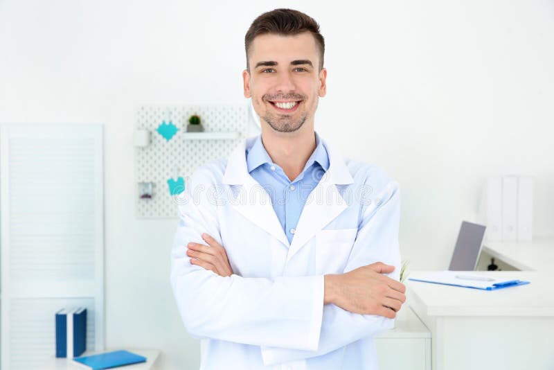 Ung male receptionist arkivbild Ung male receptionist arkivbild