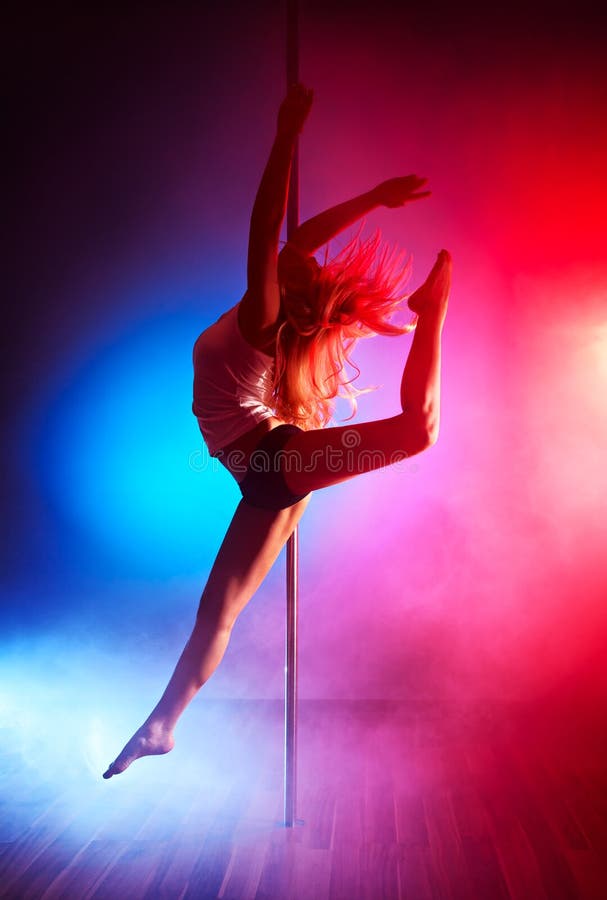 Young pole dance woman jumping. Young pole dance woman jumping.