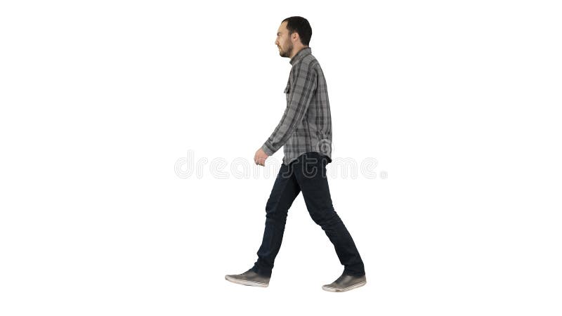 Ung tillf?llig man som g?r p? vit bakgrund arkivfoto Ung tillf?llig man som g?r p? vit bakgrund arkivfoto