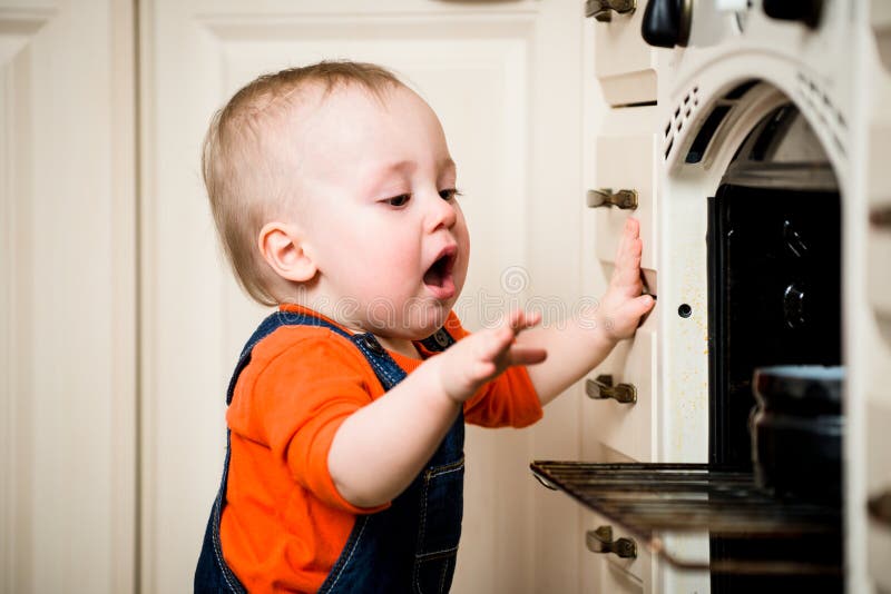 Unguarded baby with open oven