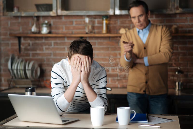 Unhappy boy having some problems in his family