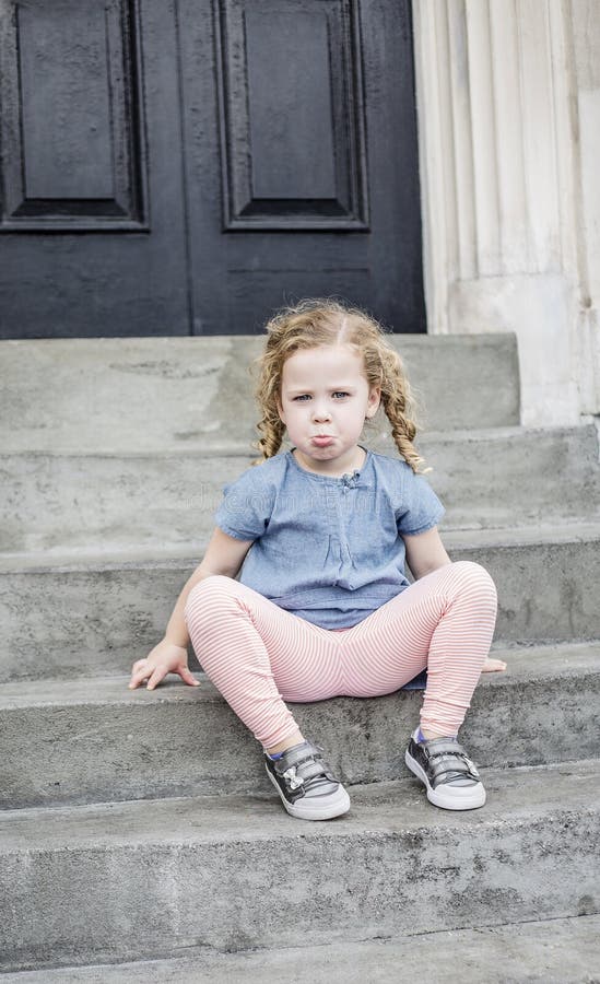 Unhappy Little Girl with Curly Hair Sitting on the Front Steps of Her Urban Home Stock Photo - Image of hair, depression: 114220816 Unhappy Little Girl with Curly Hair Sitting on the Front Steps of Her Urban Home Stock Photo - Image of hair, depression: 114220816
