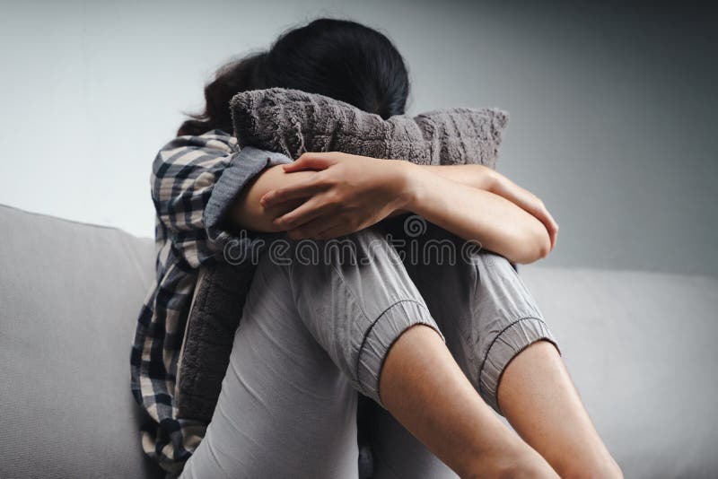 sad depressed young woman hiding her face 19577262 Stock Photo at