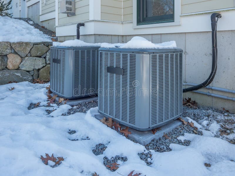 Unidades de la calefacción y de aire acondicionado usadas para calentar y para refrescar una casa