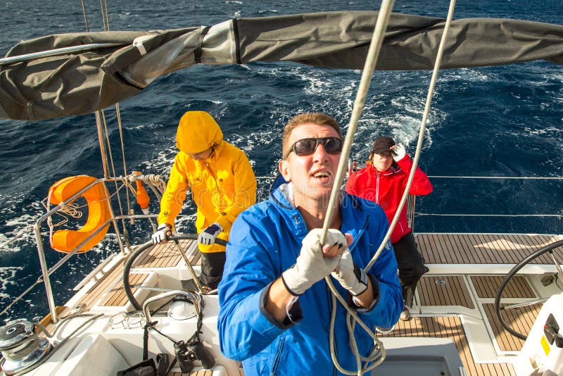 Unidentified sailors participate in sailing regatta 12th Ellada Autumn 2014 among Greek island group in the Aegean Sea