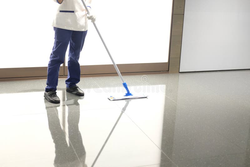 Uniformed Cleaner Wipes the Floor Using a Mop Stock Image Image of