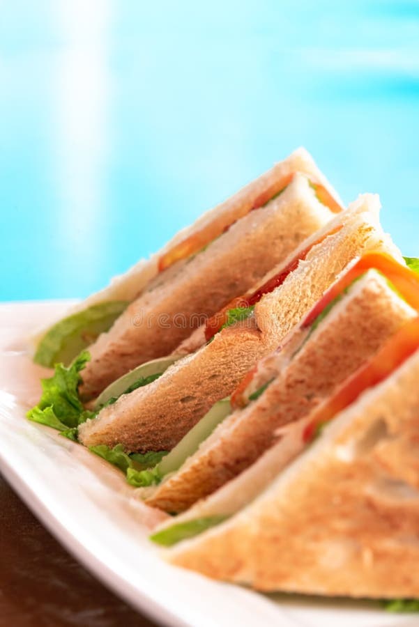 Union Club House Sandwich being serve beside the turquoise blue swimming pool or beach. Selective Focus royalty free stock image Union Club House Sandwich being serve beside the turquoise blue swimming pool or beach. Selective Focus royalty free stock image