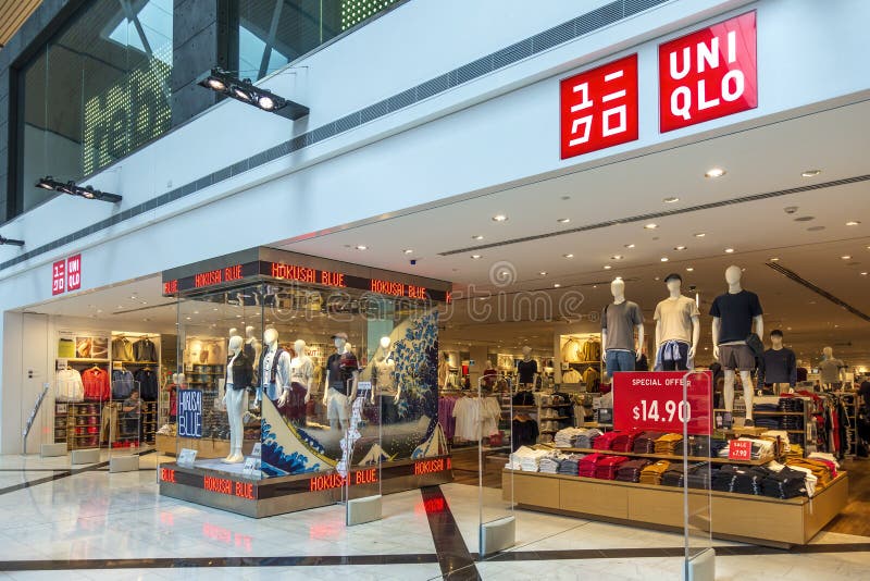 Uniqlo Clothing Store in a Mall, with Lots of Different Fall and Winter ...