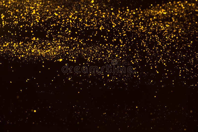 Unique abstract gold dust rain bokeh royalty free stock images