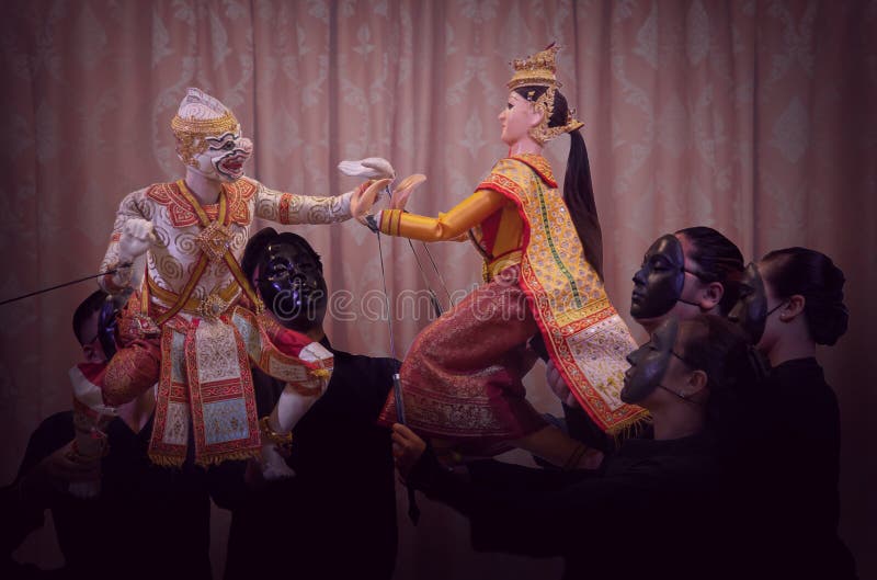 Unique pop-art thai marionette performance on background. 14 April 2019, Bangkok,Thailand. Unique pop-art thai marionette performance on dark background royalty free stock photo Unique pop-art thai marionette performance on background. 14 April 2019, Bangkok,Thailand. Unique pop-art thai marionette performance on dark background royalty free stock photo