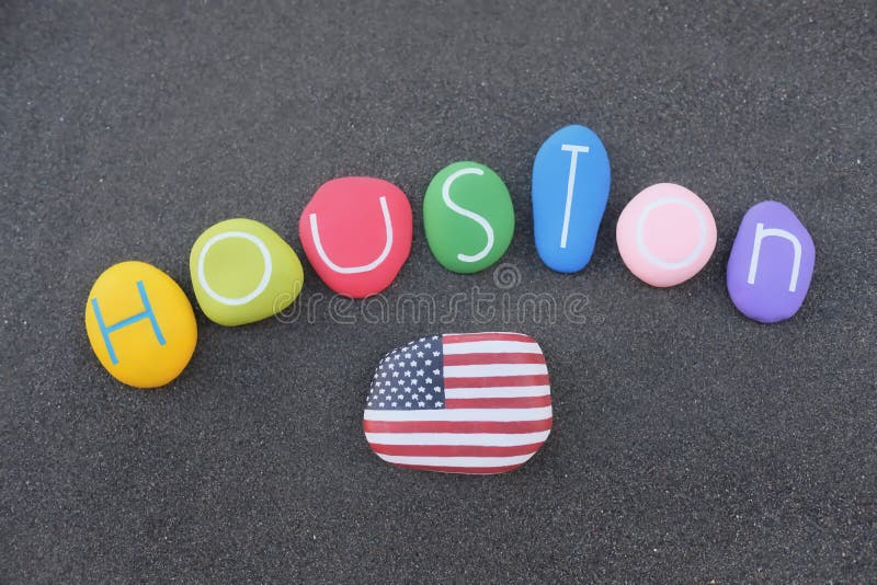 Houston, souvenir of the main city of Texas, United States of America with colored stones over black volcanic sand royalty free stock photos Houston, souvenir of the main city of Texas, United States of America with colored stones over black volcanic sand royalty free stock photos